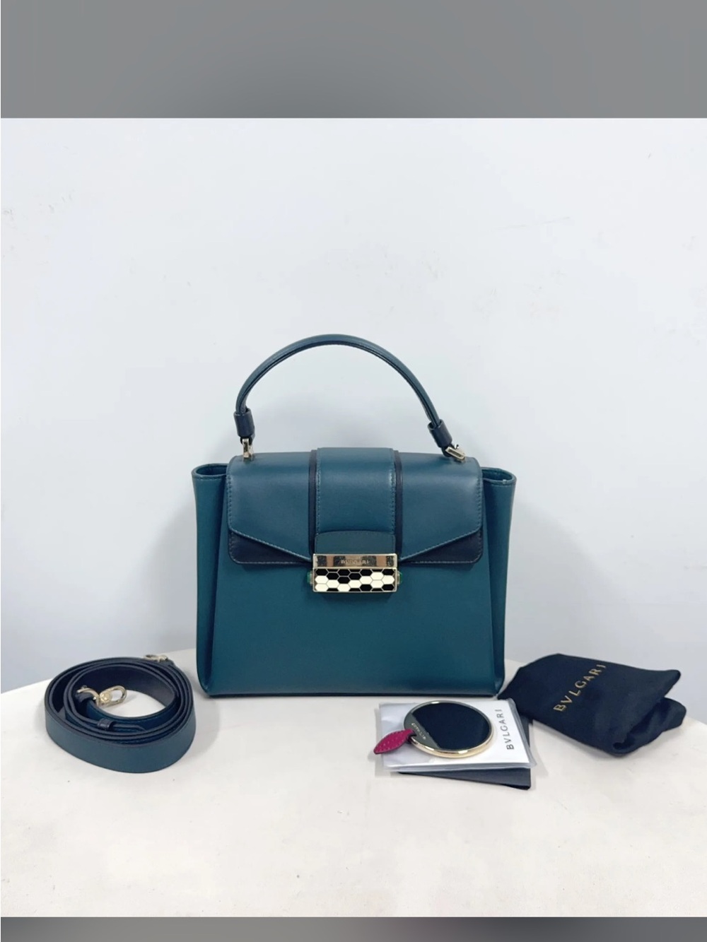 Bvlgari green with crossbody strap excellent